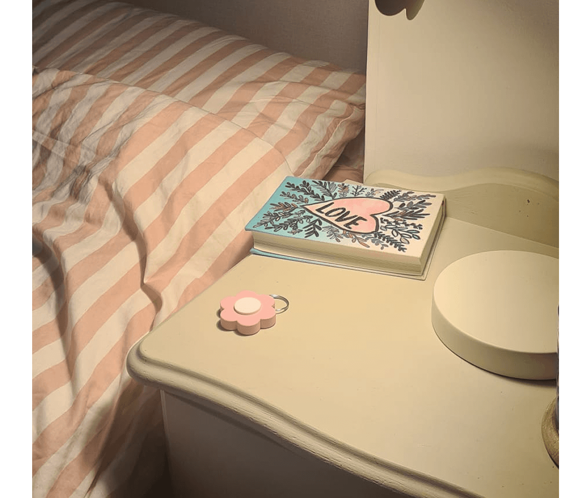 Faerd Lock Charm on a bedside table